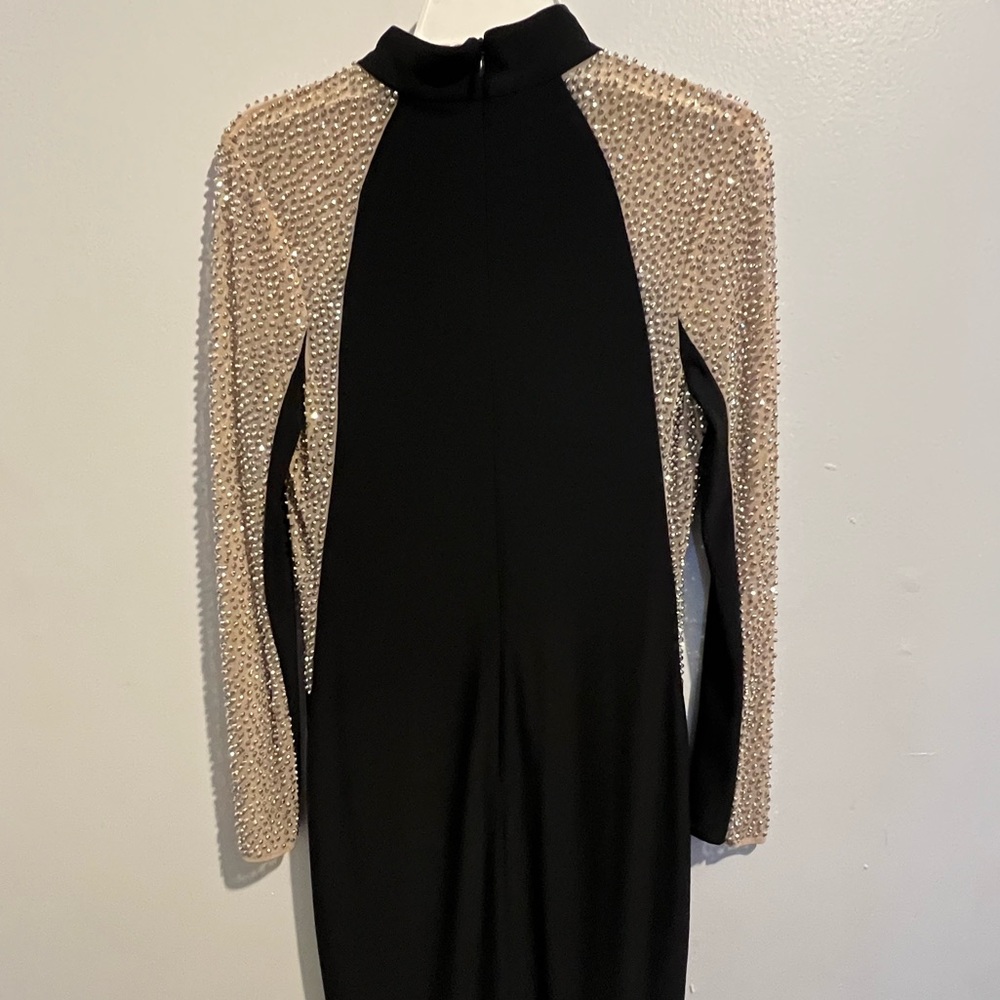 Gold and black knee length dress